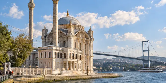 Ortakoy Mosque on the Bosphorus with the 15 July Martyrs Bridge in Istanbul