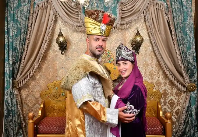 Ottoman couple costume photo experience with traditional Sultan and royal clothing
