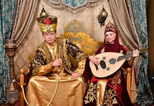 Ottoman costume photo experience with traditional Sultan clothing and musical props